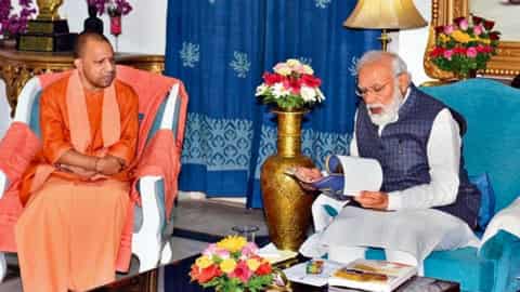 pm_narendra_modi_yogi_adityanath_1637514052